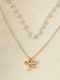 Gold Layered Necklace with Bow Pendant